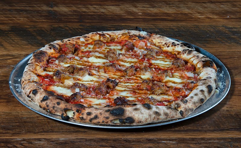 Salsiccia e Friarielli punch pizza with Italian sausage and broccoli rabe