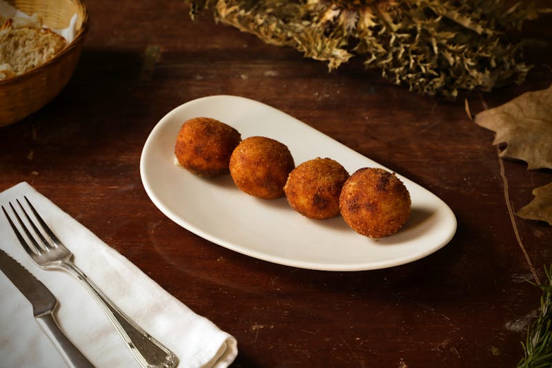 Arancini di Riso crispy fried risotto balls with mozzarella filling