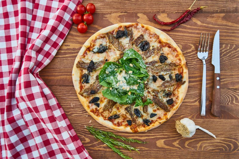 Truffle Bianca white punch pizza with truffle oil and mushrooms